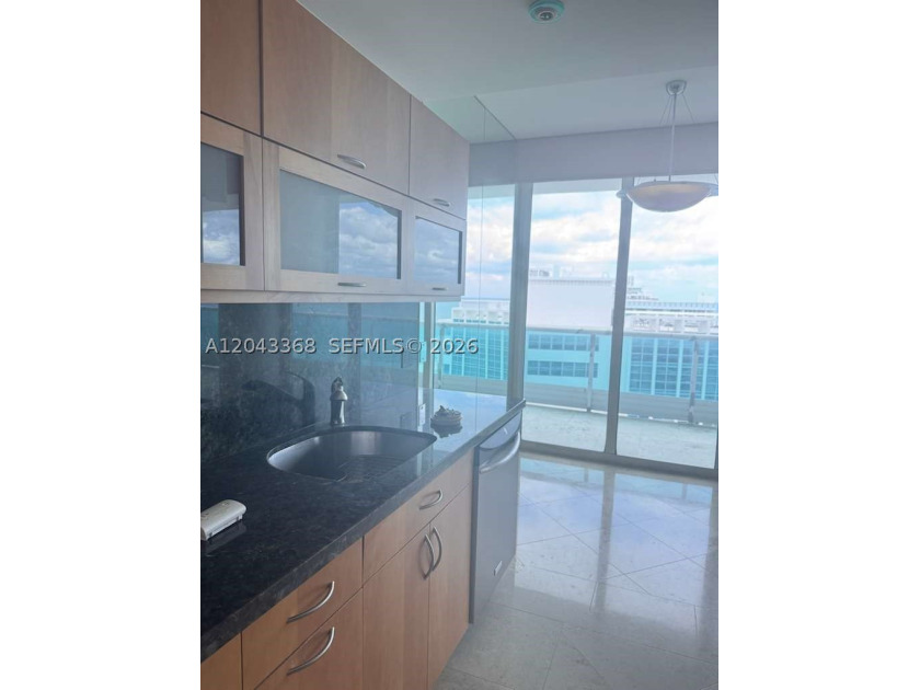 Beach's most sought-after boutique oceanfront buildings! In the - photo 22