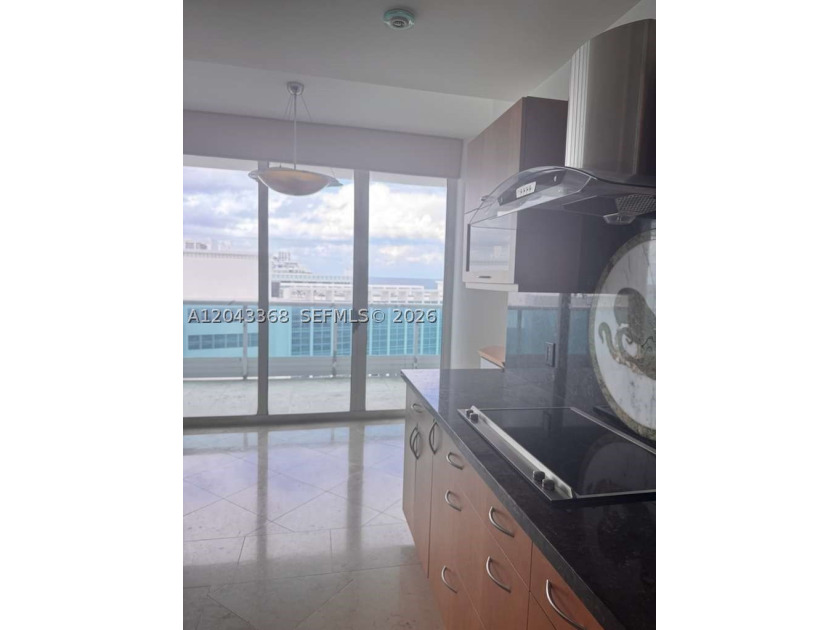 Beach's most sought-after boutique oceanfront buildings! In the - photo 25