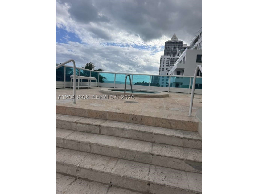Beach's most sought-after boutique oceanfront buildings! In the - photo 35