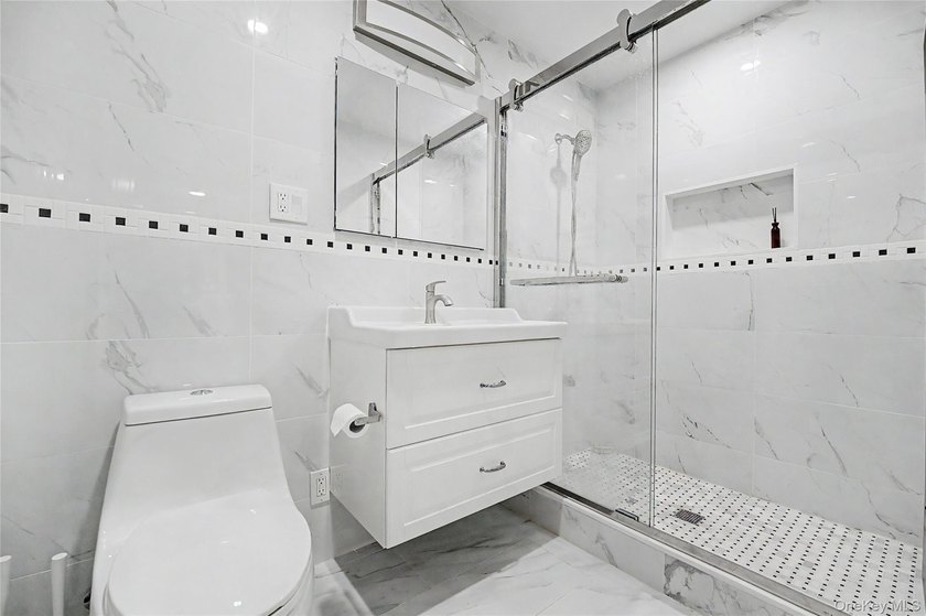 Located in the heart of Great Neck Village, this impeccably - photo 11