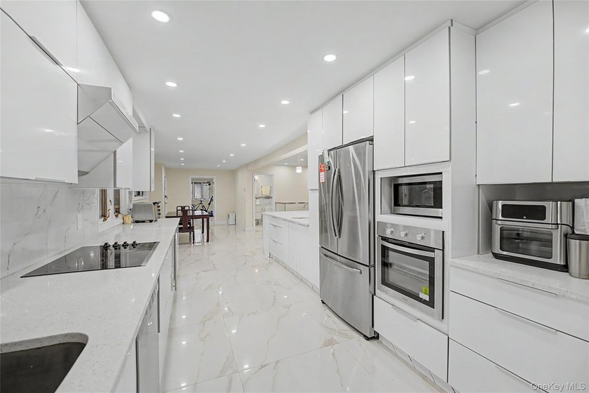 Located in the heart of Great Neck Village, this impeccably - photo 16
