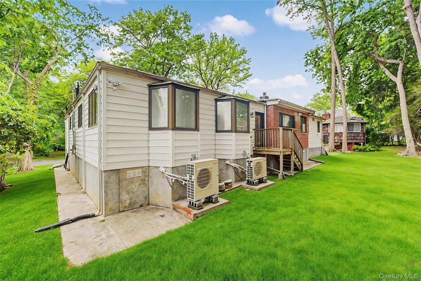 Located in the heart of Great Neck Village, this impeccably - photo 24