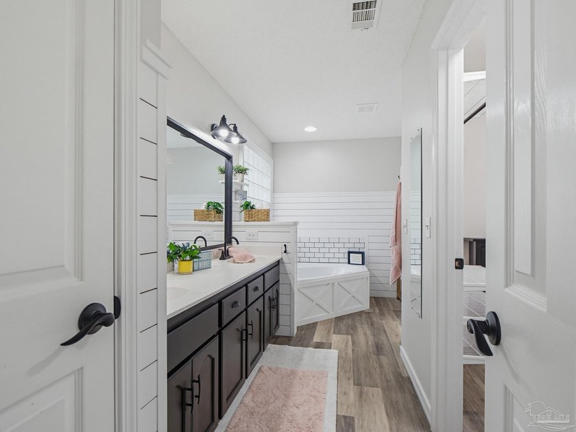 Property is located in the beautiful, tree-lined community of - photo 33