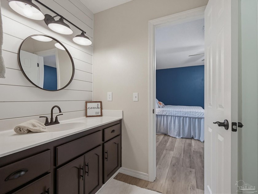Property is located in the beautiful, tree-lined community of - photo 50