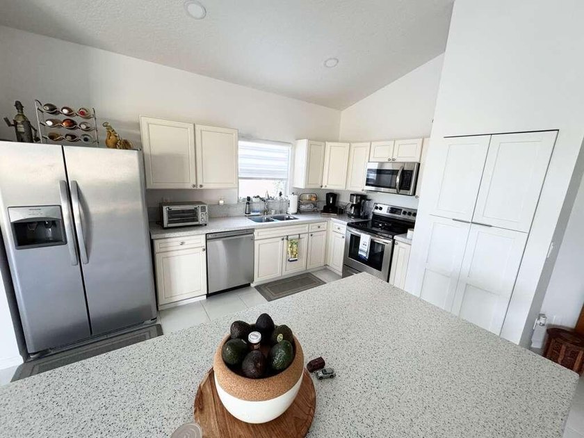 Beautifully updated lakefront home featuring a 2023 roof, impact - photo 4