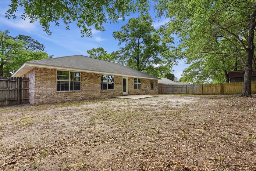 Welcome home to this beautifully maintained brick residence - photo 31