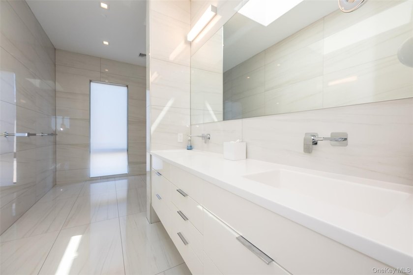 Experience unparalleled luxury in this custom modern estate - photo 18