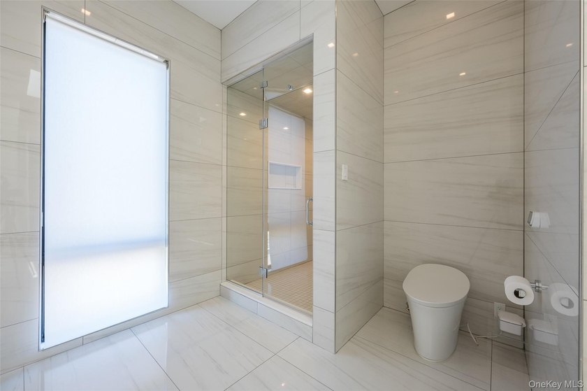 Experience unparalleled luxury in this custom modern estate - photo 19