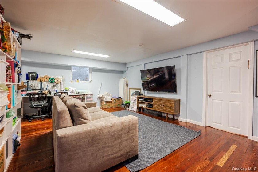 Welcome to this sunlit all brick center hall colonial located in - photo 23