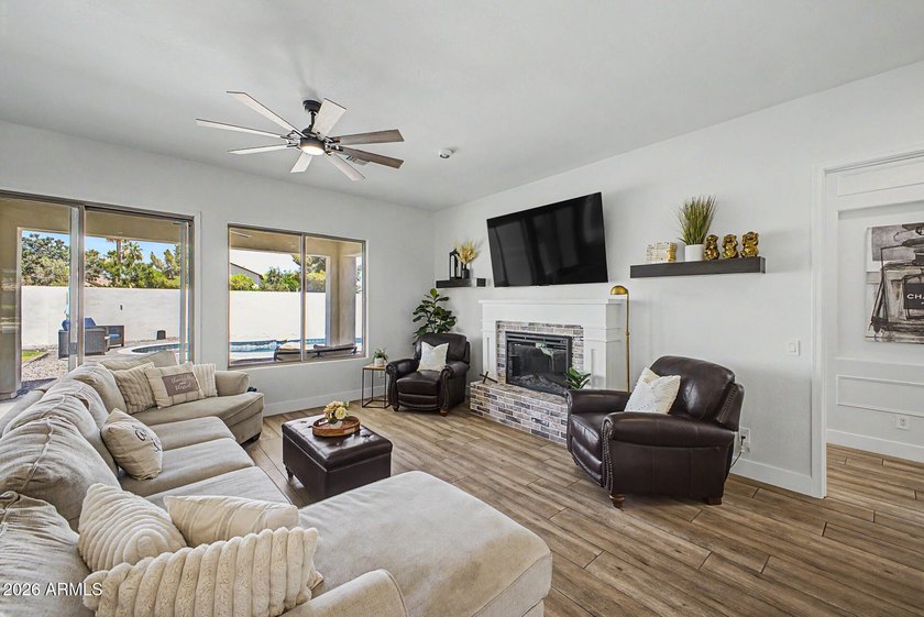 Welcome to this spacious and beautifully updated home tucked - photo 3
