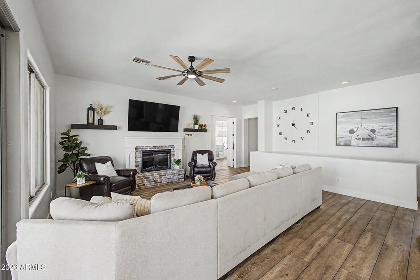 Welcome to this spacious and beautifully updated home tucked - photo 7