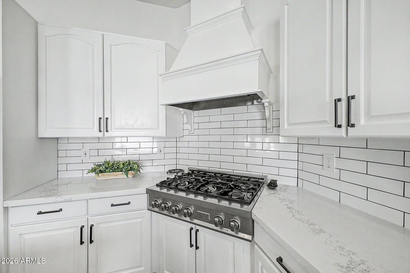 Welcome to this spacious and beautifully updated home tucked - photo 9