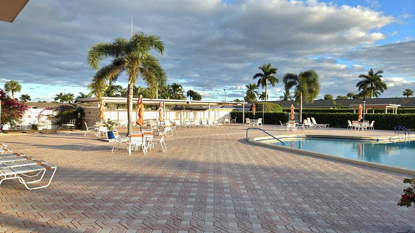 Welcome home to this beautifully upgraded villa in a peaceful - photo 16