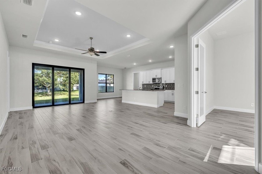 ASSESSMENTS PAID truly making this new construction home - photo 3