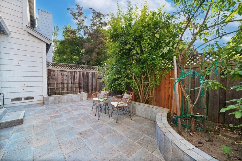 *A private, low-maintenance backyard and a spacious primary - photo 11