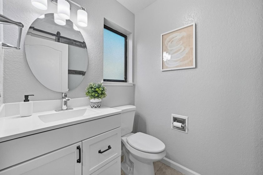 *A private, low-maintenance backyard and a spacious primary - photo 12