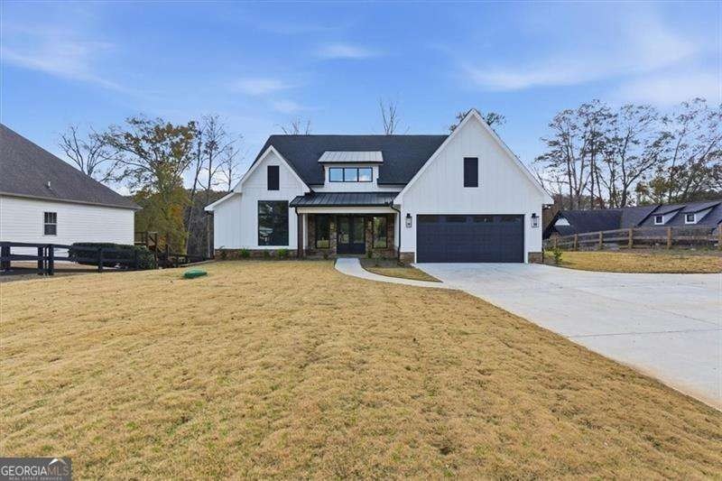 Nestled directly on the banks of the Etowah River, this - photo 5