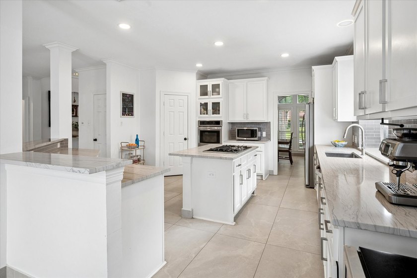Light, bright, and beautifully updated, this 4-bedroom home - photo 11