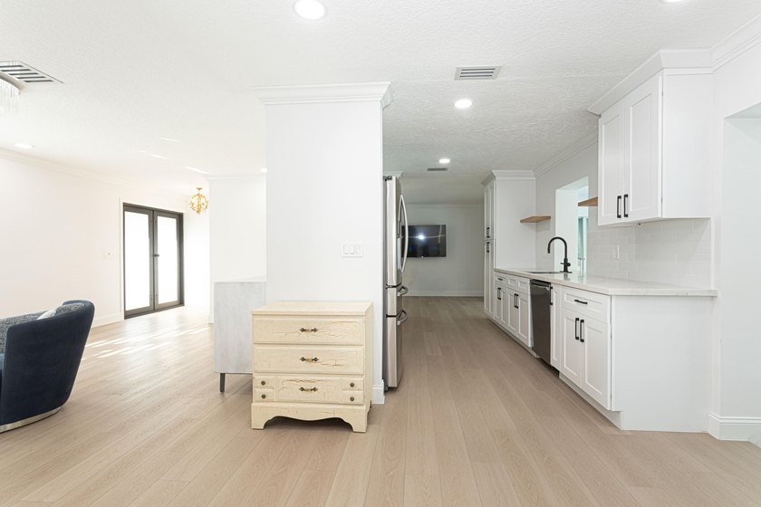 Tucked away on an oversized corner lot in the sought-after - photo 15