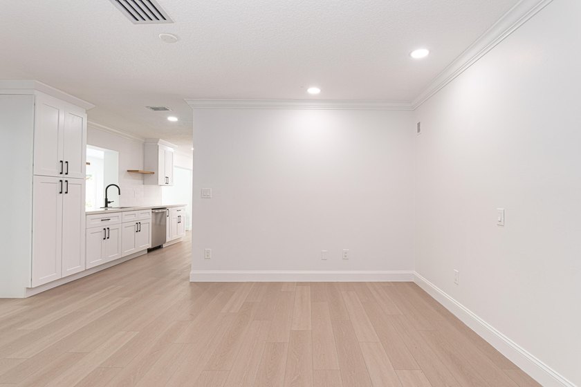 Tucked away on an oversized corner lot in the sought-after - photo 18