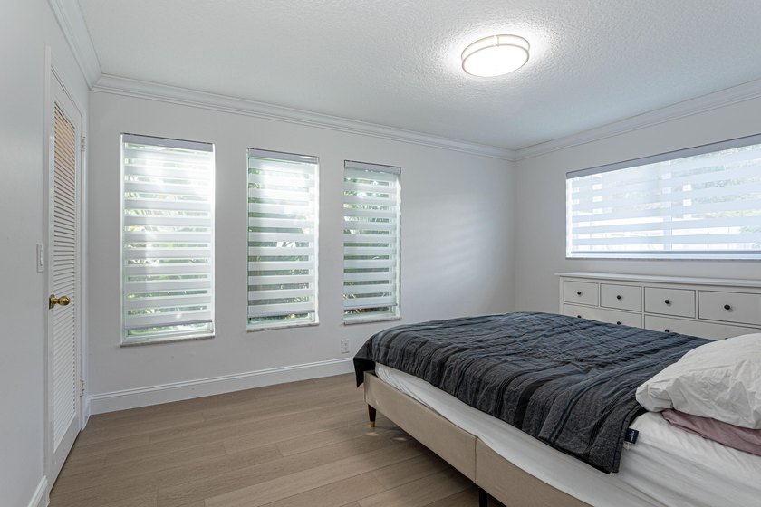 Tucked away on an oversized corner lot in the sought-after - photo 27