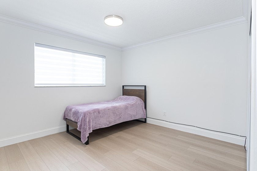 Tucked away on an oversized corner lot in the sought-after - photo 30