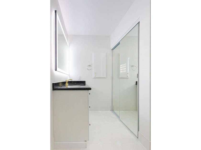 Tucked away on an oversized corner lot in the sought-after - photo 37