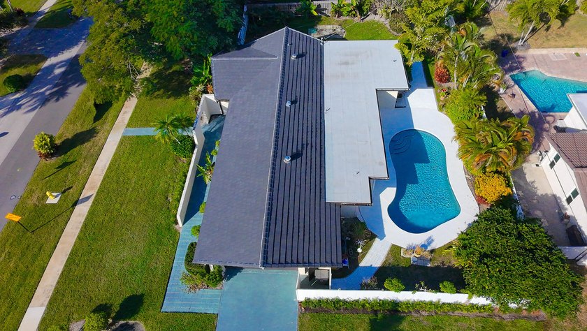 Tucked away on an oversized corner lot in the sought-after - photo 49