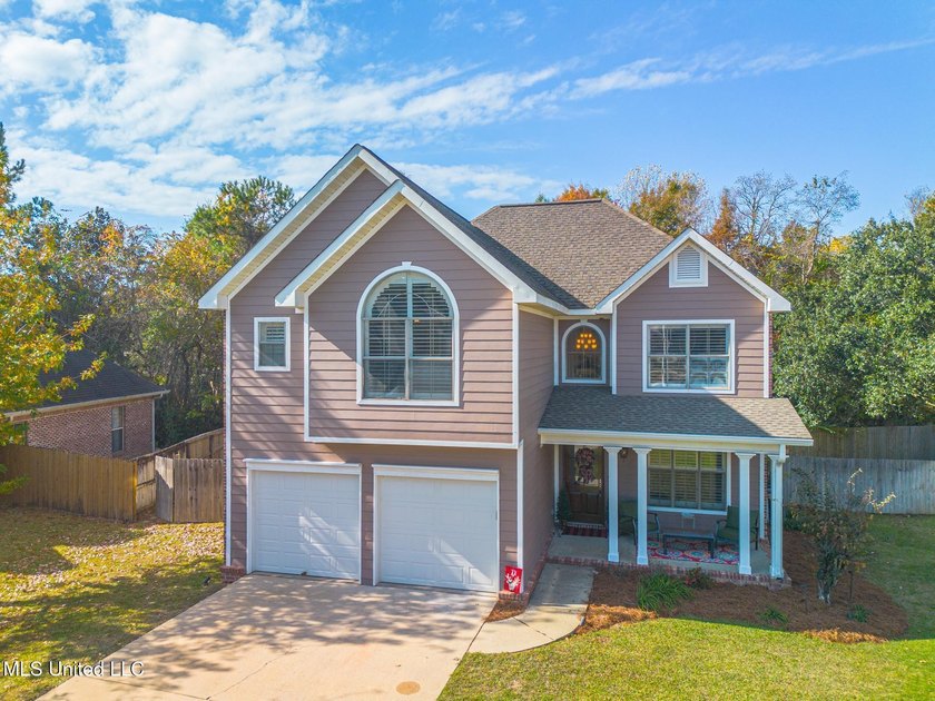 Take a look at this spacious home tucked away on a quiet - photo 3