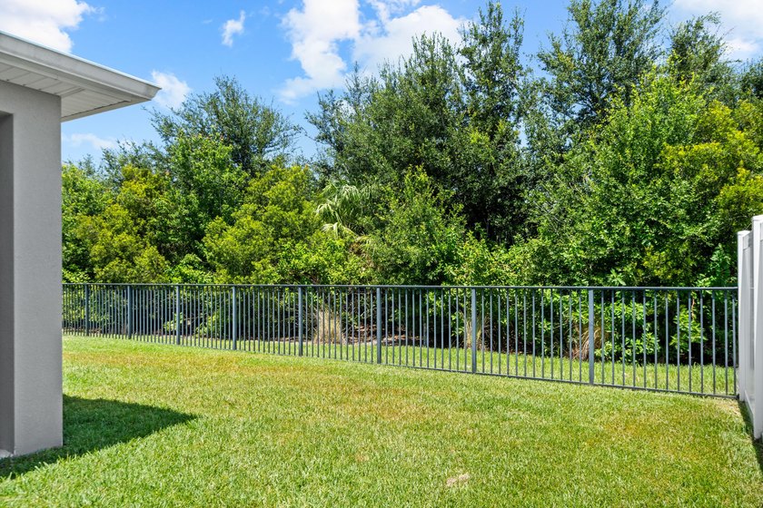 Welcome to this beautifully maintained 2021-built home offering - photo 24