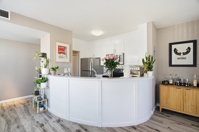 Welcome to this stunning 2-bedroom, 2-bath corner residence in a - photo 6