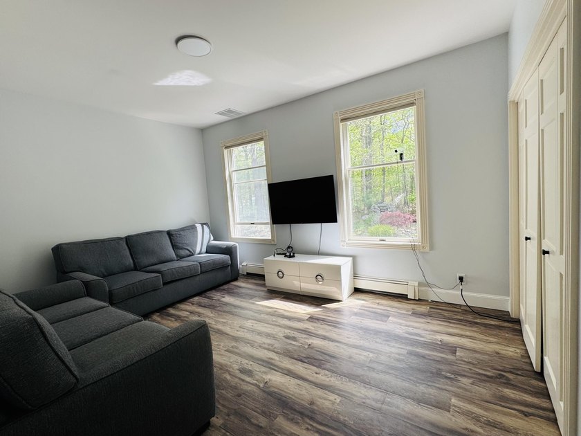 Enjoy 700' of gated private Sebago Lake frontage with this - photo 17