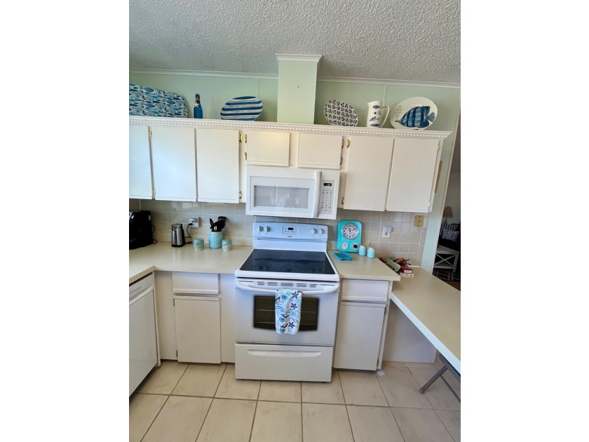 This meticulously maintained two-bedroom, two-bath home is - photo 4