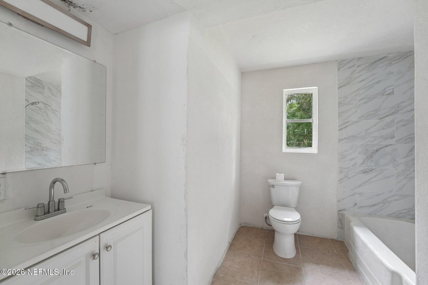 Completely remodeled and move in ready, this 4 bedroom, 2 - photo 24