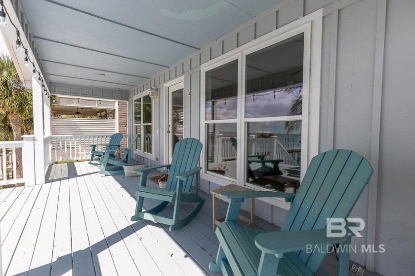 ENJOY BEAUTIFUL SUNSETS AND BAYFRONT LIVING EVERYDAY. This - photo 25