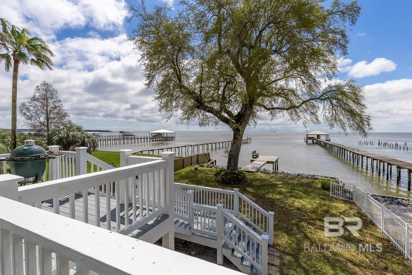 ENJOY BEAUTIFUL SUNSETS AND BAYFRONT LIVING EVERYDAY. This - photo 27