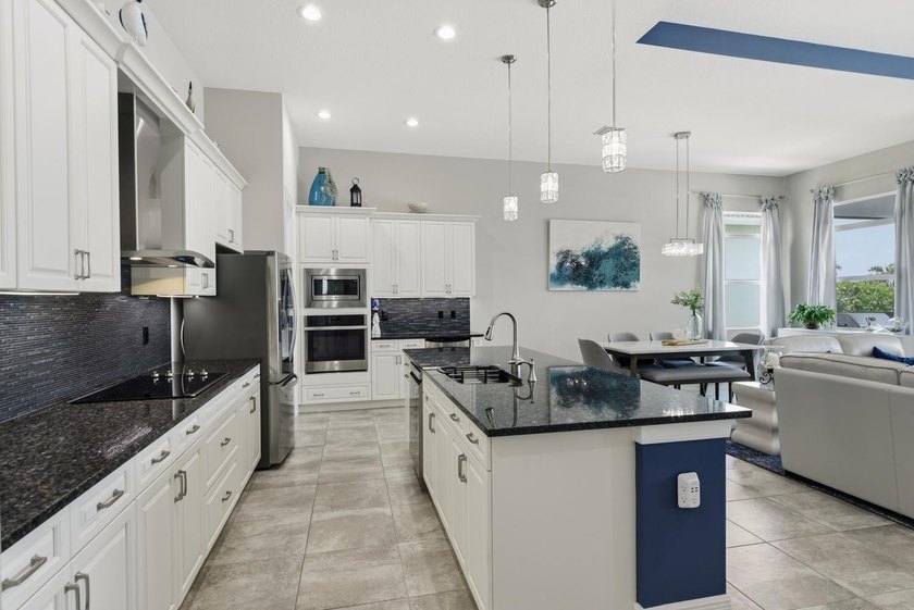 Stunning 3 bedroom home in PGA Verano. Featuring a 15x30 premium - photo 8