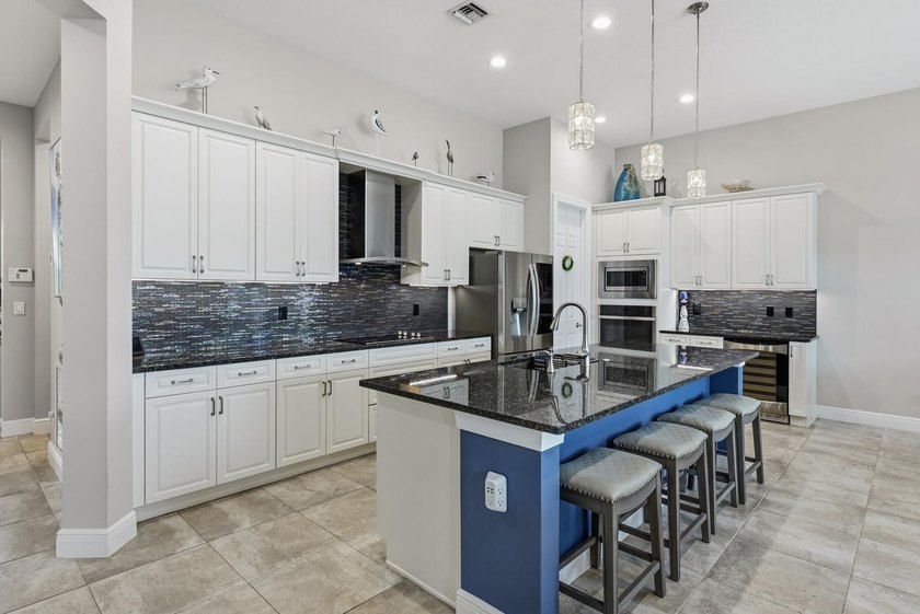 Stunning 3 bedroom home in PGA Verano. Featuring a 15x30 premium - photo 9