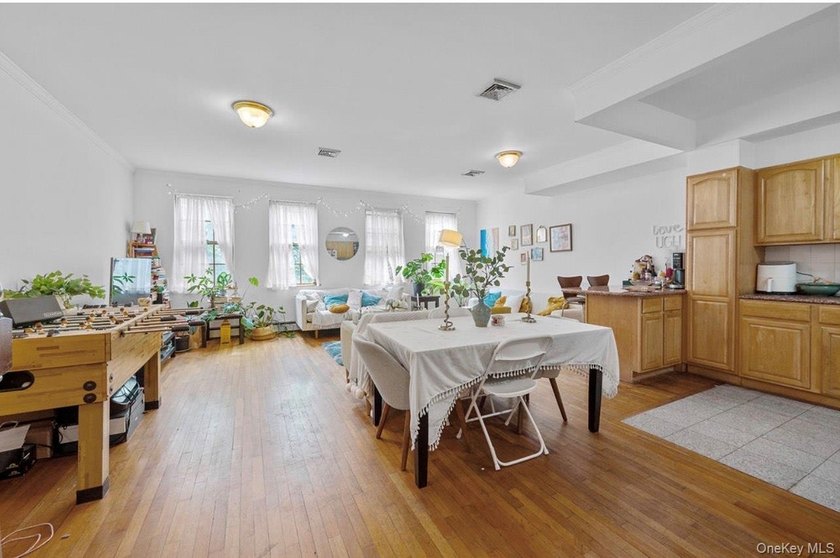 Don't miss this rare chance to own a spacious two-family home - photo 2