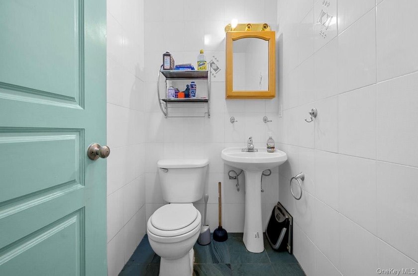 Don't miss this rare chance to own a spacious two-family home - photo 5