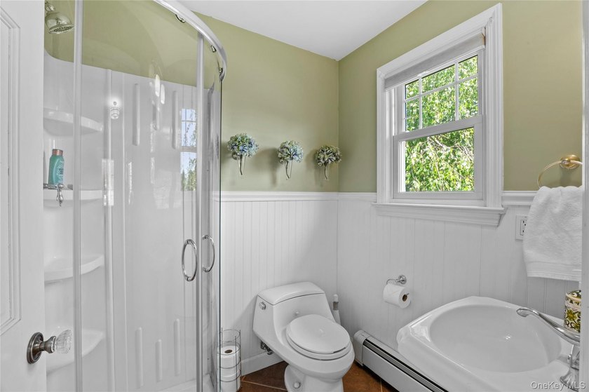 1928 Colonial in Riverhead - Tesla Solar Roof, 3-Car Heated - photo 36