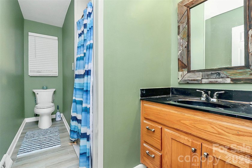 Waterfront on Moss Lake! Stunning home with year-round - photo 26