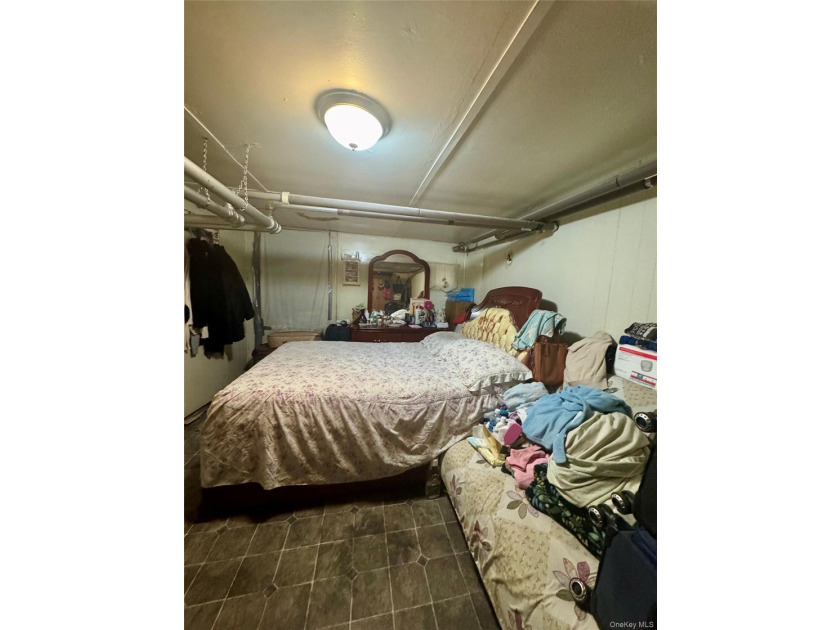 Welcome to this solid brick two-family home located in the heart - photo 8