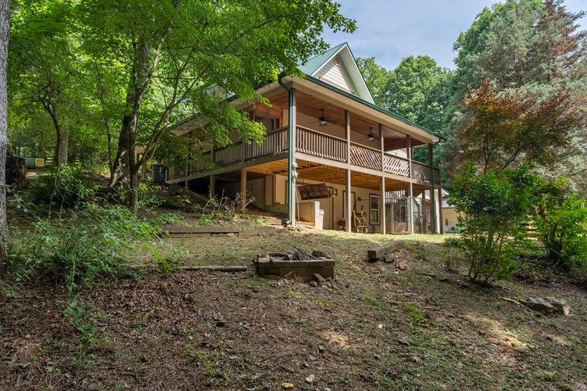 CREEKFRONT MINI-FARM with a HUGE garage workshop and car LIFT is - photo 3