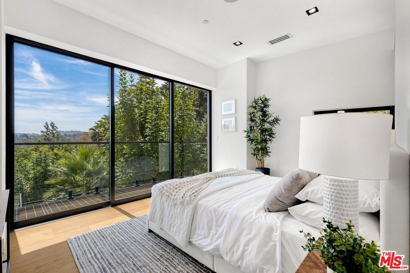View property nestled in the hills of Encino, this newly - photo 25