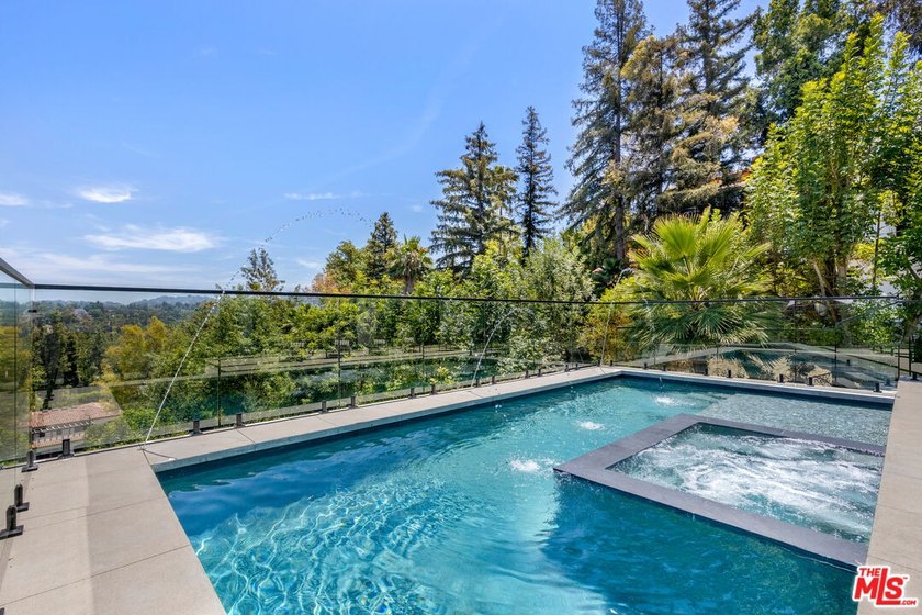 View property nestled in the hills of Encino, this newly - photo 35