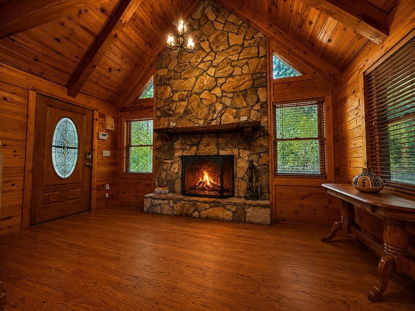 Tucked into a private wooded setting on top of the mountain in - photo 6