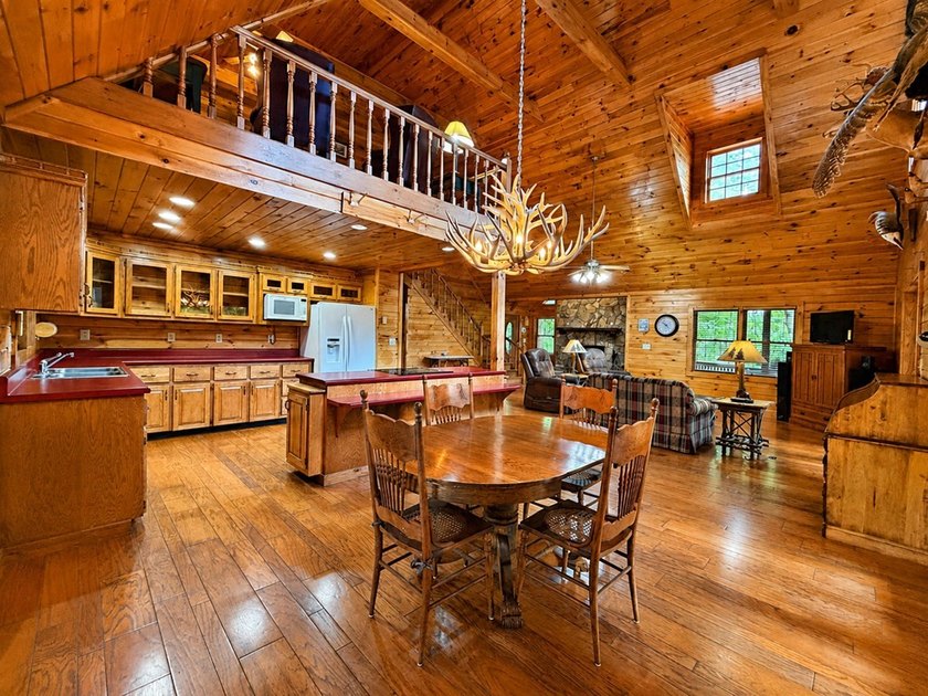 Tucked into a private wooded setting on top of the mountain in - photo 8
