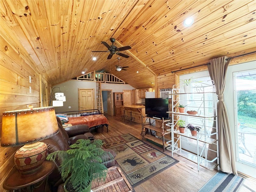 Enjoy peaceful riverfront living in this charming 1-bedroom - photo 11