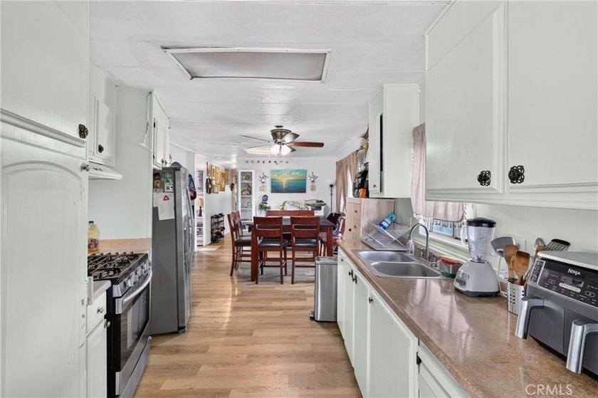 Welcome to this inviting 3-bedroom, 2-bath mobile home offering - photo 16